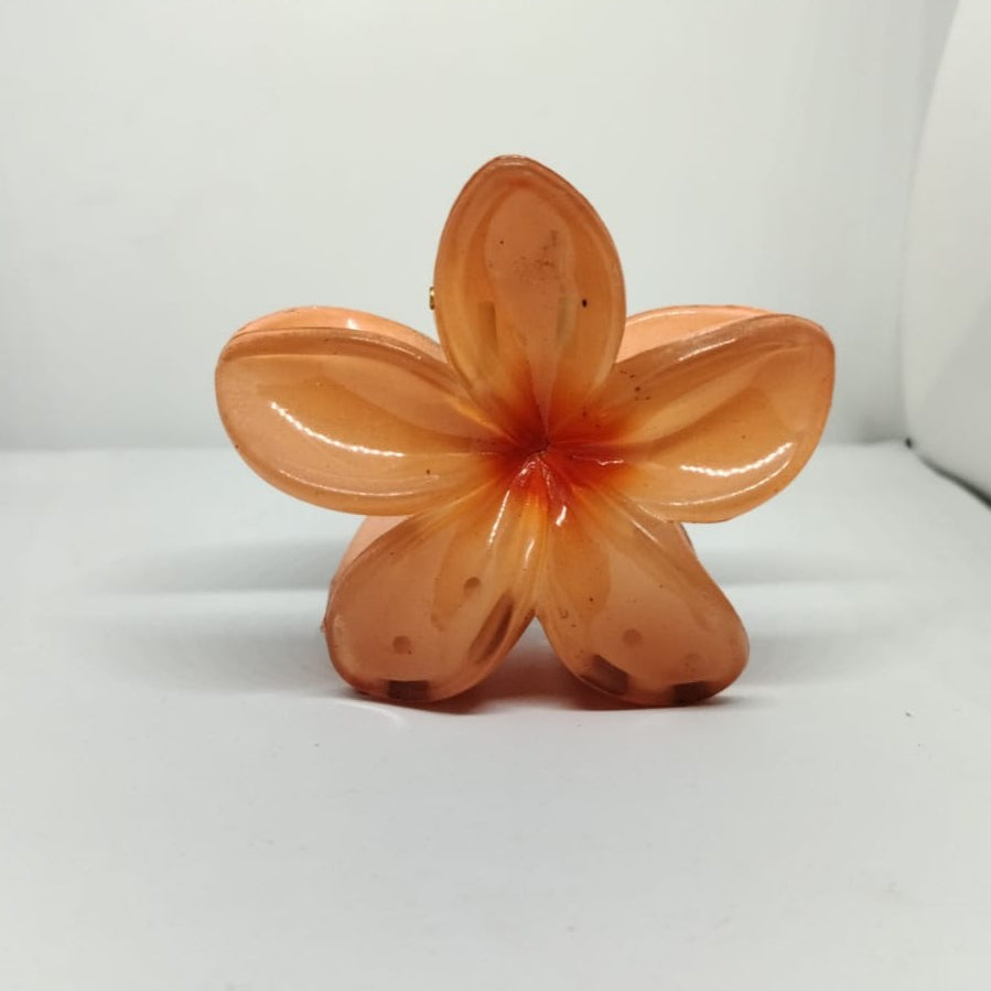 Serraw orange Hawaiian flower hair clip with glossy petals and realistic floral design